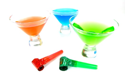 Cosmopolitan cocktails and party favours isolated against a white background