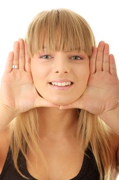 Young woman frame her face with hands