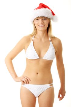 Sensual young woman wearing christmas hat. Isolated