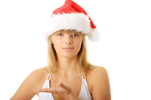 Sensual young woman wearing christmas hat. Isolated