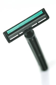A disposable razor isolated against a white background