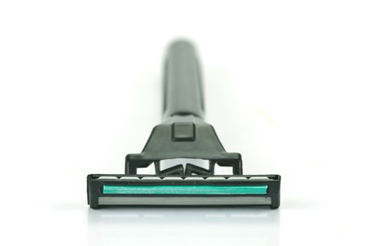 A disposable razor isolated against a white background