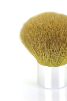 Makeup brushes isolated against a white background