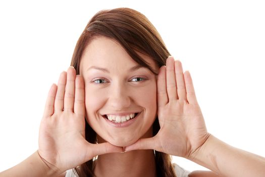 Casual caucasian young woman framing her face with her hands isolated on white background
