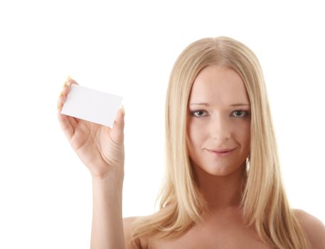 Young blond woman with businesscard in hand - focus on card