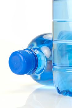 Bottle drinking water isolated against a white background