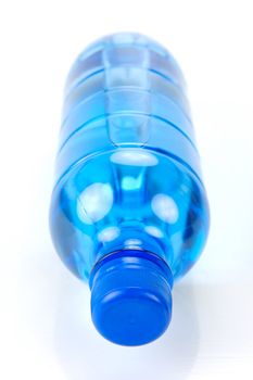Bottle drinking water isolated against a white background