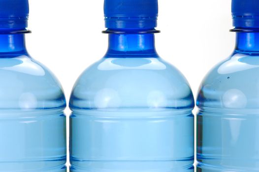 Bottle drinking water isolated against a white background