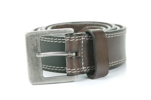 Brown belts isolated against a white background