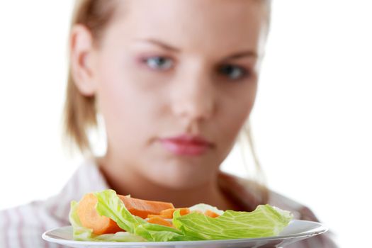 Female and her salad isolated on white background