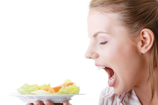 Female eating her salad isolated on white background