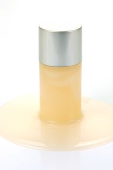 Miniatureshampoo bottles isolated against a white background