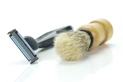 Shaving items isolated against a white background
