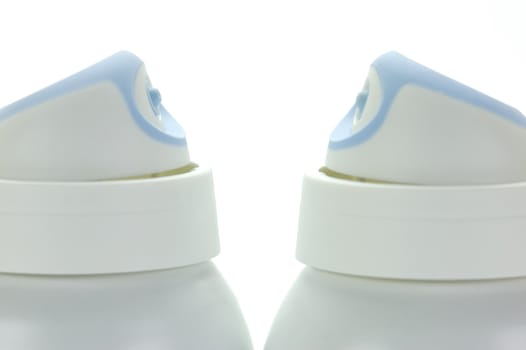 Aerosol heads isolated against a whit background
