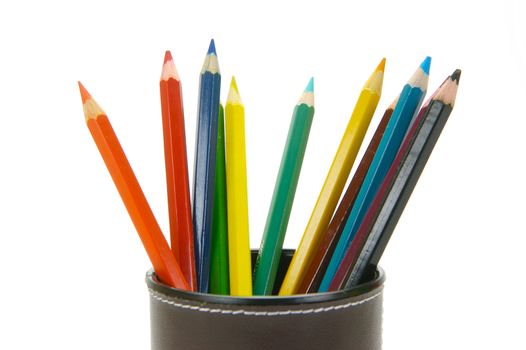 Colored Pencils in a cup holder isolated against a white background