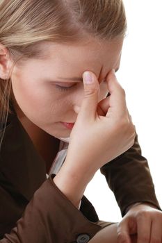 Woman with severe Migraine Headache holding hands to head