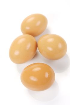 Free range eggs isolated against a white background