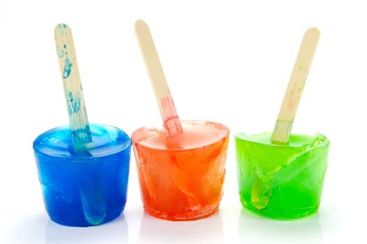 Flovored icy poles isolated against a white background