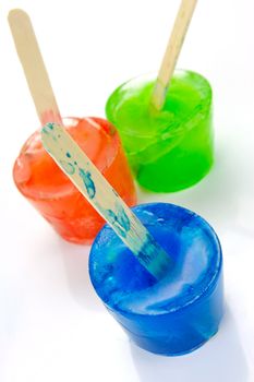 Flovored icy poles isolated against a white background