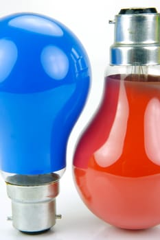 Colored light bulbs isolated against a white background