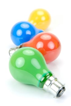Colored light bulbs isolated against a white background