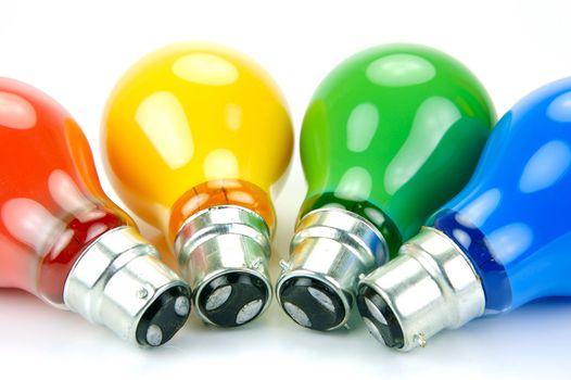 Colored light bulbs isolated against a white background