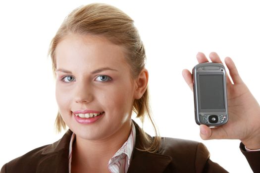 Attractive business woman smiling while using a pda. Isolated on white.
