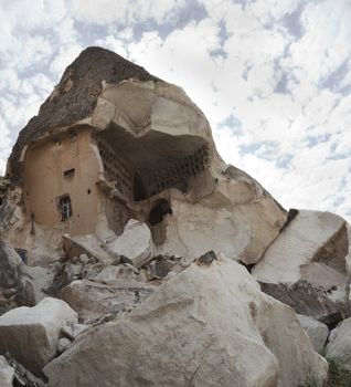 square format of a former family home and pigeon coop in a Goreme Cave now derelict and in ruins, crop space and copy space