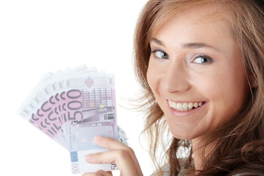 Happy young woman holding money isolated on white