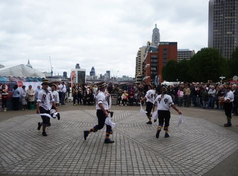 Central London - September 13: Morris Dancers at the River Thames Festival  September 13th, 2009 in Central London.