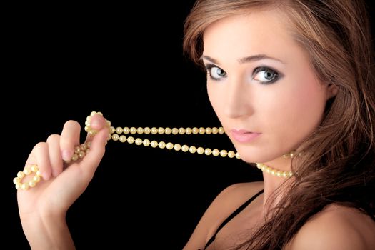 The dreaming woman with a pearl necklace