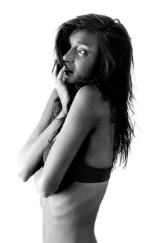 Emotional portrait of abused, crying, beautiful, young ,caucasian woman in underwear - violence concept