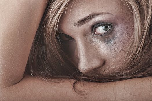 Emotional portrait of abused, crying, beautiful, young ,caucasian woman in underwear - violence concept, high emotional - hdr
