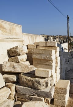 Limestone brick stack at a building site in Goreme clear blue sky, Cappadocia, Portrait, crop area, copy