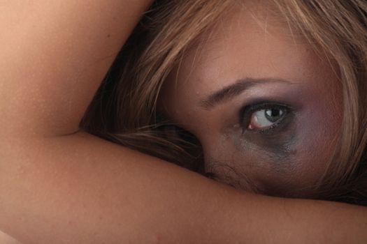 Emotional portrait of abused, crying, beautiful, young ,caucasian woman in underwear - violence concept