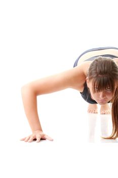 Relaxed fit woman doing exercise, isolated on white background.