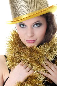 Young beautiful caucasian woman in black elegant party dress and gold hat