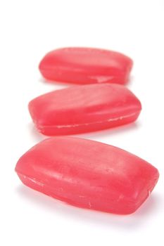 Bars of raspberry soap isolated against a white background