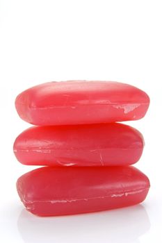 Bars of raspberry soap isolated against a white background