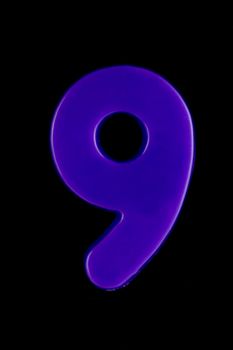 Numbers isolated against a black background
