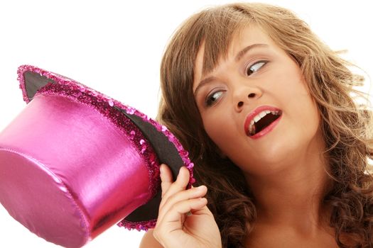 Sexy showgirl girl in pink disco hat over white