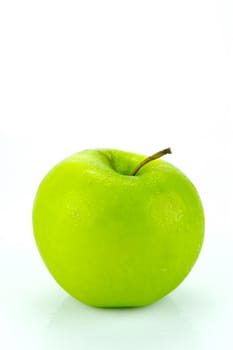 A rgreen apple isolated against a white background