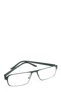 A pair of reading glasses isolated against a white background