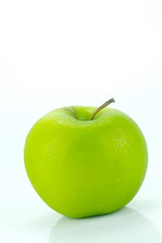 A rgreen apple isolated against a white background