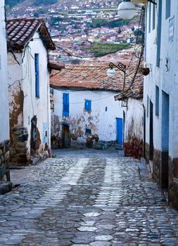 Old narrow street in the center of Cusco Peru