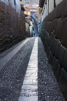 Old narrow street in the center of Cusco Peru