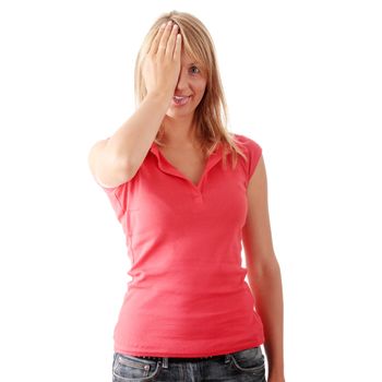 Isolate studio shot of a casually dressed young adult woman covering her eyes.