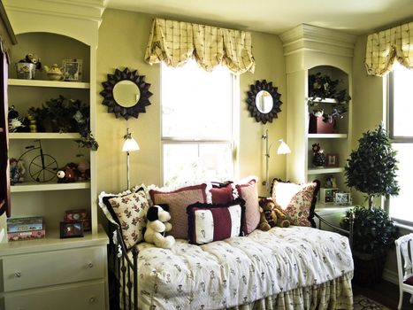 Guest room with day bed and built in shelving