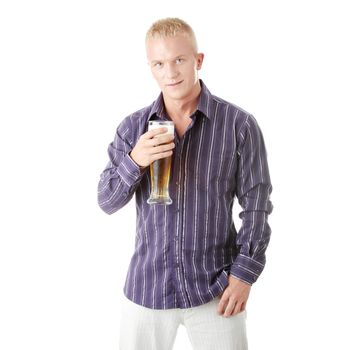 Happy young man holding a glass of beer isolated