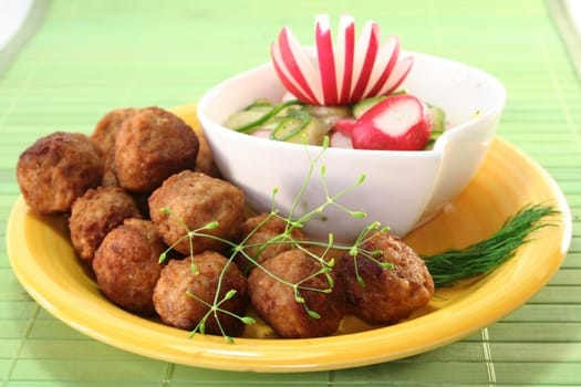 Swedish meatballs with radish-cucumber salad